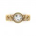 0.61 carat 18K Gold - Entwined Halo Engagement Ring